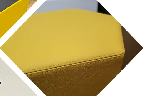 Großaufnahme einer perfekten Naht eines vollleder Sechseckhockers