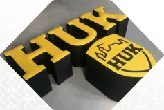 HUK Coburg Loghocker mit Bestickung 