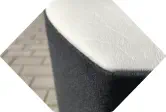 Detailaufnahme eines Hocker Sitzelementes in Teilleder